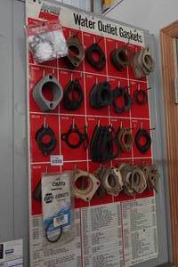 lot 108 image: Vintage Fel-Pro Water Outlet Gasket Display