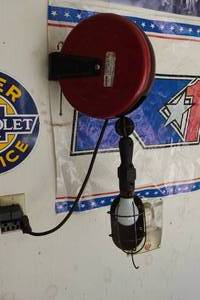 lot 121 image: Sears Cord Reel with Work Light