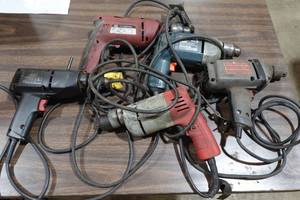 lot 211 image: Assorted Corded Drills - Milwaukee