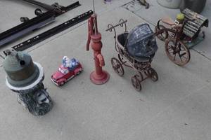 lot 612 image: Yard Dcor - Raccoon, Truck, Pump, Buggy