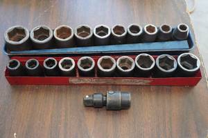 lot 39 image: 12 Drive Shallow Impact Sockets with Swivel Adapter