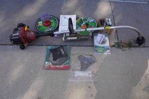 lot 327 image: Homelite Gas Trimmer with Accessories