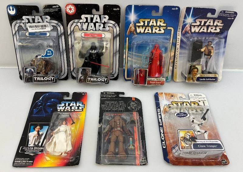 lot 9 image: Misc. STAR WARS Action Figures (NOC) Cards Beat up