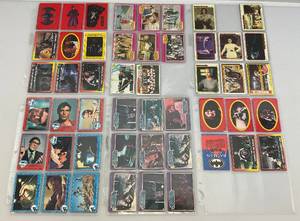 lot 21 image: Misc. Vintage Trading Cards In Protective Sleeves