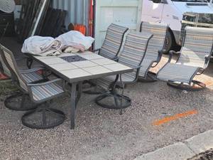 lot 2 image: Outdoor Patio Furniture Set with Tile Table and Swivel Chairs