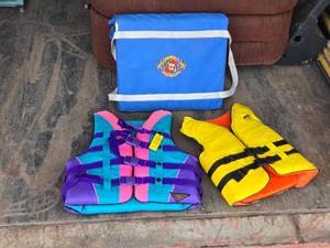 lot 65 image: Lot of Life Jackets and Seat Cushion