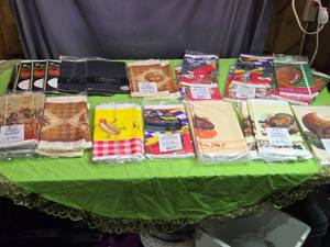 lot 85 image: Lot of Assorted Plastic Table Covers