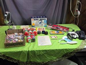 lot 89 image: Assorted Sewing and Beauty Lot with Black & Decker Iron and New in Package Curling Iron
