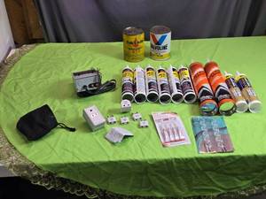 lot 90 image: Assorted Lot Valvoline Motor Oil, Plug Adapters, and Adhesives