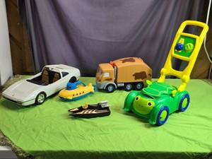 lot 98 image: Assorted Toy Vehicle Lot - Car, Submarine, Boat, Garbage Truck, and Bubble Lawn Mower