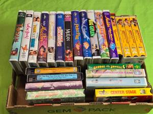 lot 101 image: Lot of 26 Vintage VHS Movies - Disney, Indiana Jones, and More