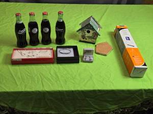 lot 106 image: Vintage Coca-Cola Bottles and Jewelry Lot with Birdhouse and Easel