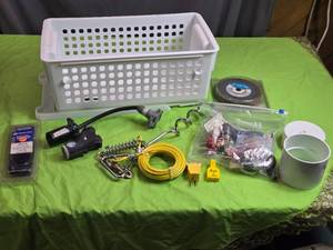 lot 185 image: Trailer Wiring Adapters, Sliding Plastic Drawer, Pet Tie Out and More