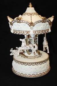 lot 485 image: 11 Collectors Musical Carousel - (White with Gold Trim)