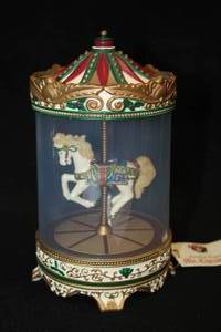 lot 492 image: 7-12 Collectors Musical Carousel Horse - from Mr. Christmas Another Original (RedWhiteGreen)