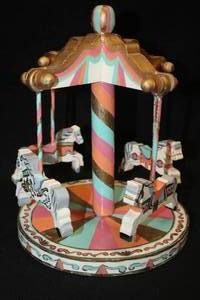 lot 500 image: 10 BluePinkOrangeBrownWhite Wooden Collectible Carousel