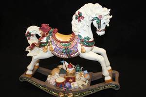 lot 507 image: 13 Christmas Presents theme Collectors Musical Carousel Horse