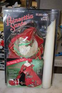 lot 1115 image: Daisy Kingdom Poinsetta Santa Holiday Decoration (New)