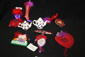 lot 1121 image: Lot of (9) Assorted Holiday Ornaments - Tea Pots, Shoes, Hats, Handbags, Hand Mirror, Wear A Red Hat Sign