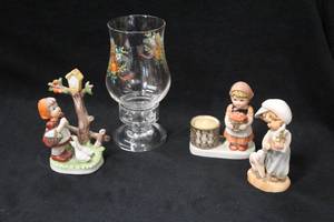 lot 1154 image: Lot of (4) Assorted Collectors Clear Glass Candleholder & Figurines - All The Lords Children by Lucas - Girl with Geese, Girl with Apples, Girl with Lamb