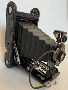 lot 34 image: Vintage Antique No. 1A KODAK Junior Camera with Manuel, Portrait Attachment Lens and Two Kodak Advertisements