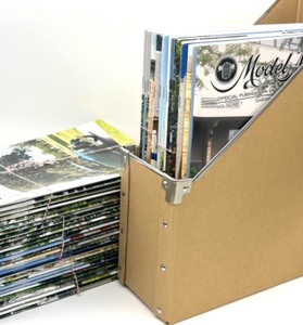 lot 165 image: 8 Years of Model A News 2006-2013 and 1 Magazine Holder