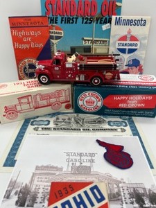 lot 177 image: Vintage STANDARD OIL Lot Includes 4 Die Cast TrucksCar, Standard Oil Stock Cert. & More