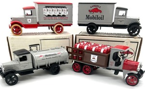lot 185 image: 4 MOBIL GARGOYLE Die Cast TrucksBanks
