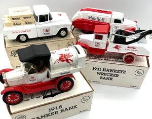 lot 196 image: 4 MOBILGAS Die Cast TrucksBanks