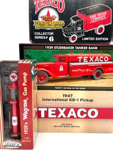 lot 230 image: 1 Die Cast Texaco Gaspump & 3 TrucksBanks