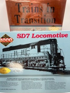 lot 231 image: Vintage NOS HO Scale SD7 Locomotive and Hardcover Book