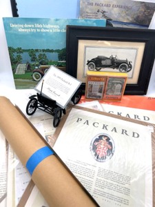 lot 246 image: Packed PACKARD Lot Includes Die Cast Packard Car, Multiple Vintage Ads, Framed Picture of Packard & More