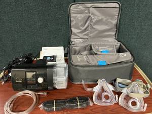 lot 35 image: MSRP $1800 ResMed AirSense 10 AutoSet WCarry Bag, Manual, Mask, and Power Cord - In Great Working Condition