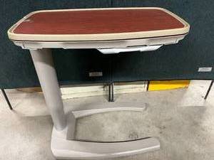 lot 8 image: MSRP $1800 TOP OF THE LINE & AWARD WINNING STRYKER TRU-FIT SPLIT TOP HEIGHT ADJUSTABLE OVERBED TABLE WSLIDE OUT VANITY COMPARTMENT & MIRROR ON BOTH SIDES - Excellent Condition