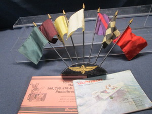 lot 96 image: Indy Speedway Flags, Seahorse & Simplicity Manuals