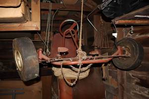 lot 5B image: Shed...Vintage Go Cart Parts & Pieces Still Hanging in Shed