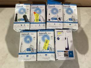 lot 346 image: LOT OF 7 Waterpik Water Flossers