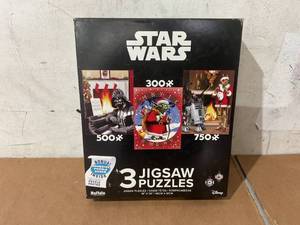 lot 270 image: Buffalo Games Star Wars Holiday Three Interlocking Jigsaw Puzzles