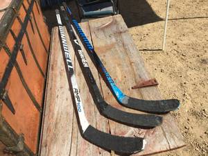 lot 172 image: 3 LH Hockey Sticks - Warrior - Winnwell - Bauer