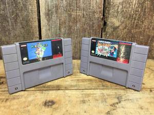 lot 237 image: 2 Nintendo SNES Super Mario World - Super Mario All Stars - Cartridges