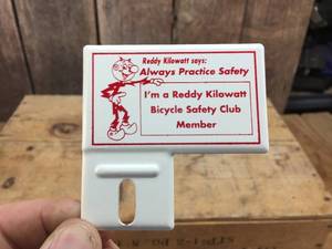 lot 241 image: Vintage Reddy Kilowatt Bicycle License Plate Holder