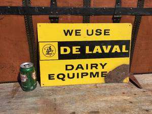lot 104 image: Vintage We Use De Laval Dairy Equipment Metal Sign