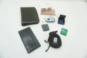 lot 65 image: Tritech item, sunglasses, folios