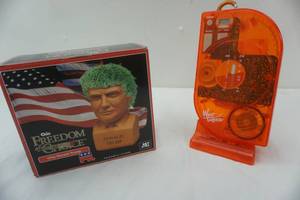 lot 83 image: Trump chia plant and shower radio