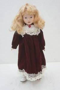 lot 91 image: Porcelain faced doll, 12