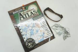 lot 112 image: Outdoors atlas, dog collar and fish stringer