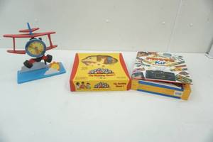 lot 114 image: Kids clock, game and photo kit