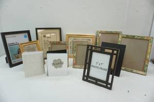 lot 144 image: Picture frame lot with two small photo albums