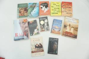 lot 197 image: paperback and hard cover novels