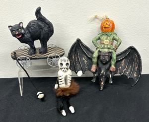 lot 72 image: Scary Skeleton, Cat and Pumpkin Decor including 7 Vintage Bethany Lowe Halloween Pumpkinhead